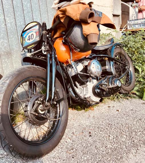 orange harley davidson racing bike built year 1949